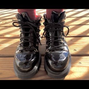Shiny black Dr. Marten (lace up) combat boots